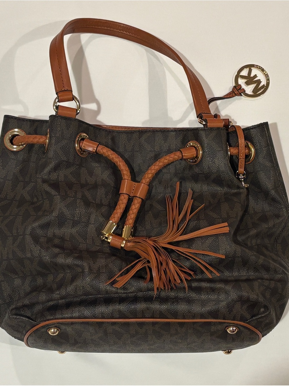 Michael Kors Jet Set Drawstring Bucket Bag Brown MK Monogram Tassel Large Tote